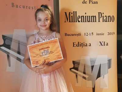 Mentiune la Concursul "Milenium Piano" si Premiul I la Concursul "Pro Piano"